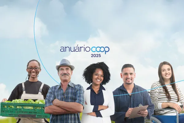 Cinco pessoas de diferentes perfis representam os diversos ramos do cooperativismo sob um céu azul, com o texto “Anuário Coop 2025” centralizado no topo da imagem.